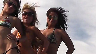 Three Girls in Bikinis on a Mountain Top Get Naked and Play with Each Other
