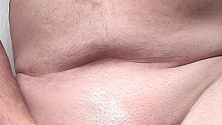 Solosexual strokes my shaved, oiled up cock to get a load of cum to swallow