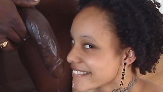 Horny stud getting his huge hard black dick sucked by cute babe