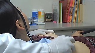 Japanese girl with pretty smile in the doctor's office