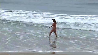 MILF with huge boobs fucking in the beach