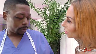 AGEDLOVE A doctor with the BBC examines a busty woman