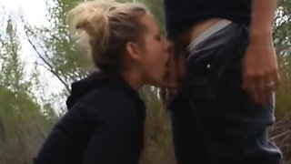 Blonde is flashing her big boobs in the outdoors