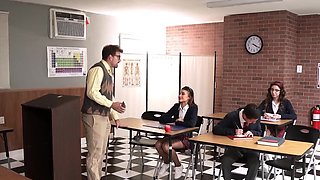 Classroom action with two hot babes and one girthy dick