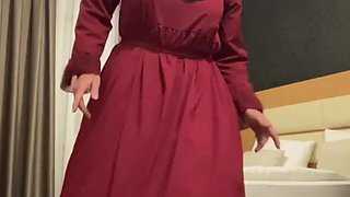 Fatima dancing in hotel room